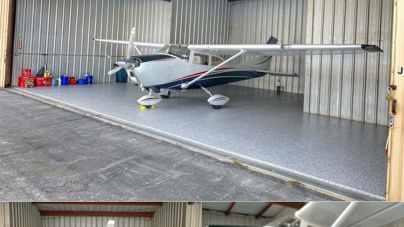single propeller plane inside hanger with a focus on the high quality floor single propeller plane inside hanger with a focus on the high quality floor