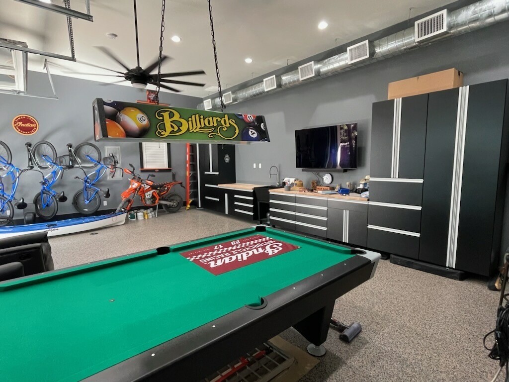 Garage with pool table inside