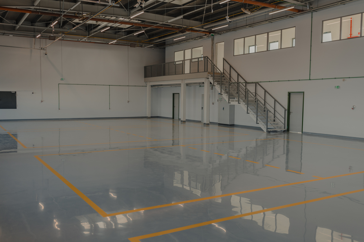 Epoxy flooring in car service space.