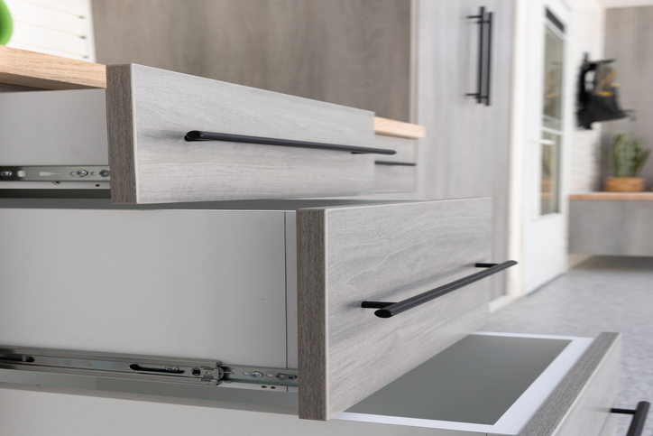 Close-up of full-extension drawer slides on custom dusk haven garage cabinets.