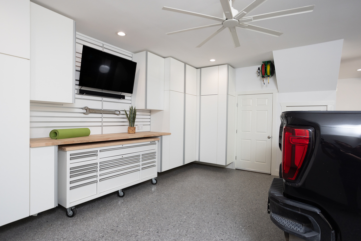 White Custom Garage Cabinets with Wooden Top.